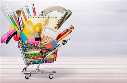 Small shopping cart filled with school supplies 